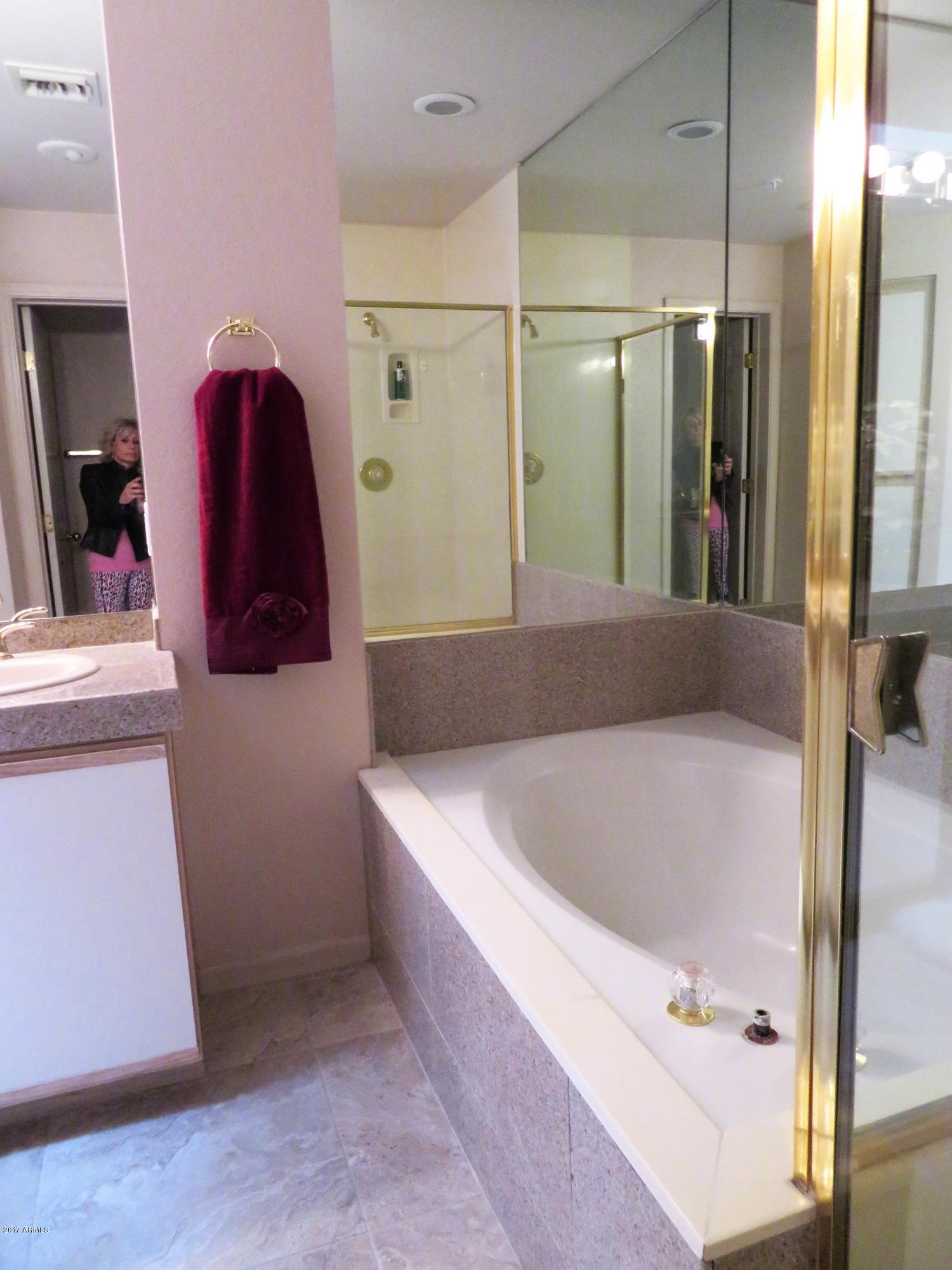 7222 East Gainey Ranch Road, Unit 114 Scottsdale, AZ 85258 - Photo 38 of 53 SEP TUB SHOWER IN MASTER