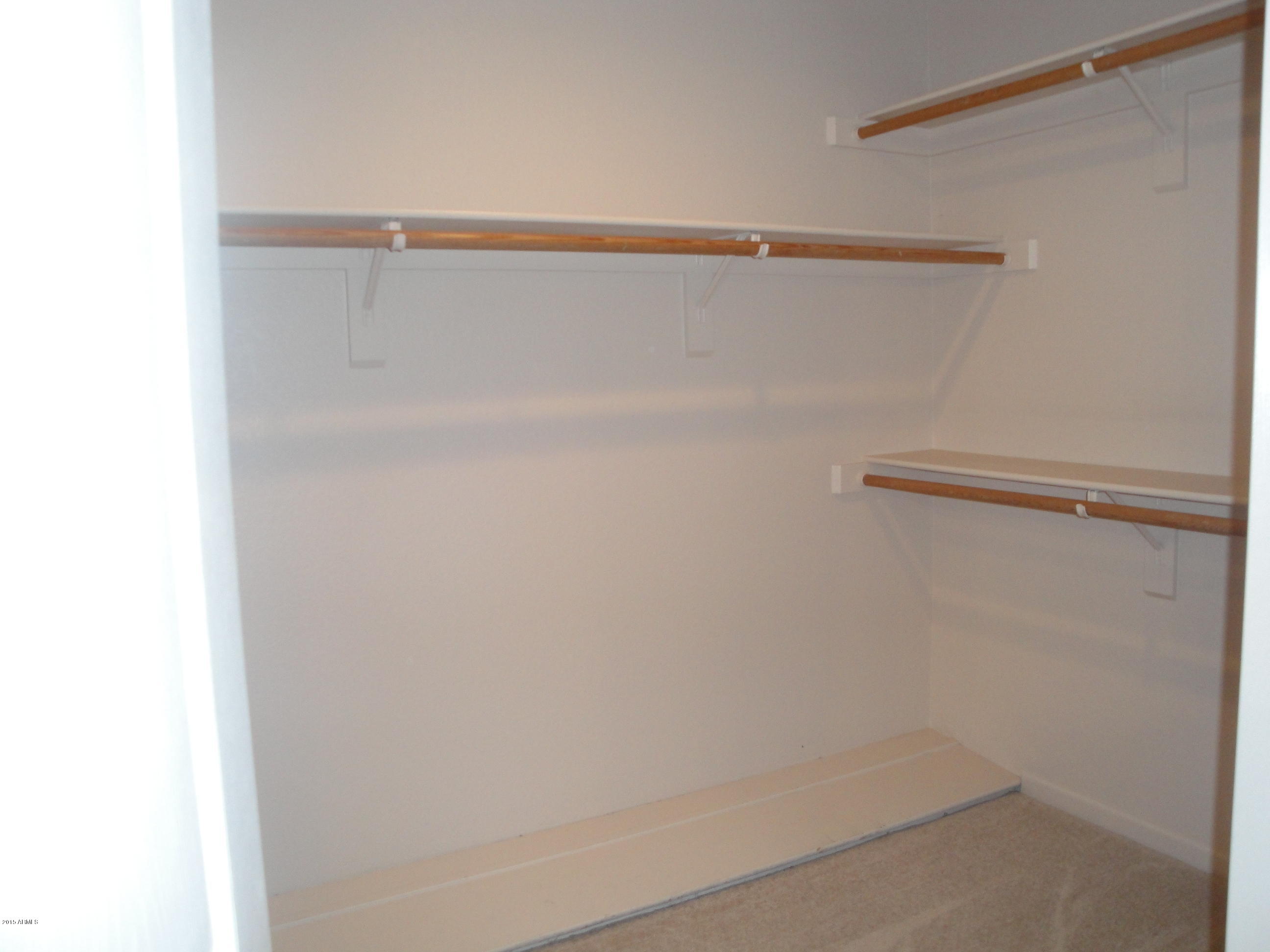 7222 East Gainey Ranch Road, Unit 114 Scottsdale, AZ 85258 - Photo 41 of 53 MASTER WALK IN CLOSET