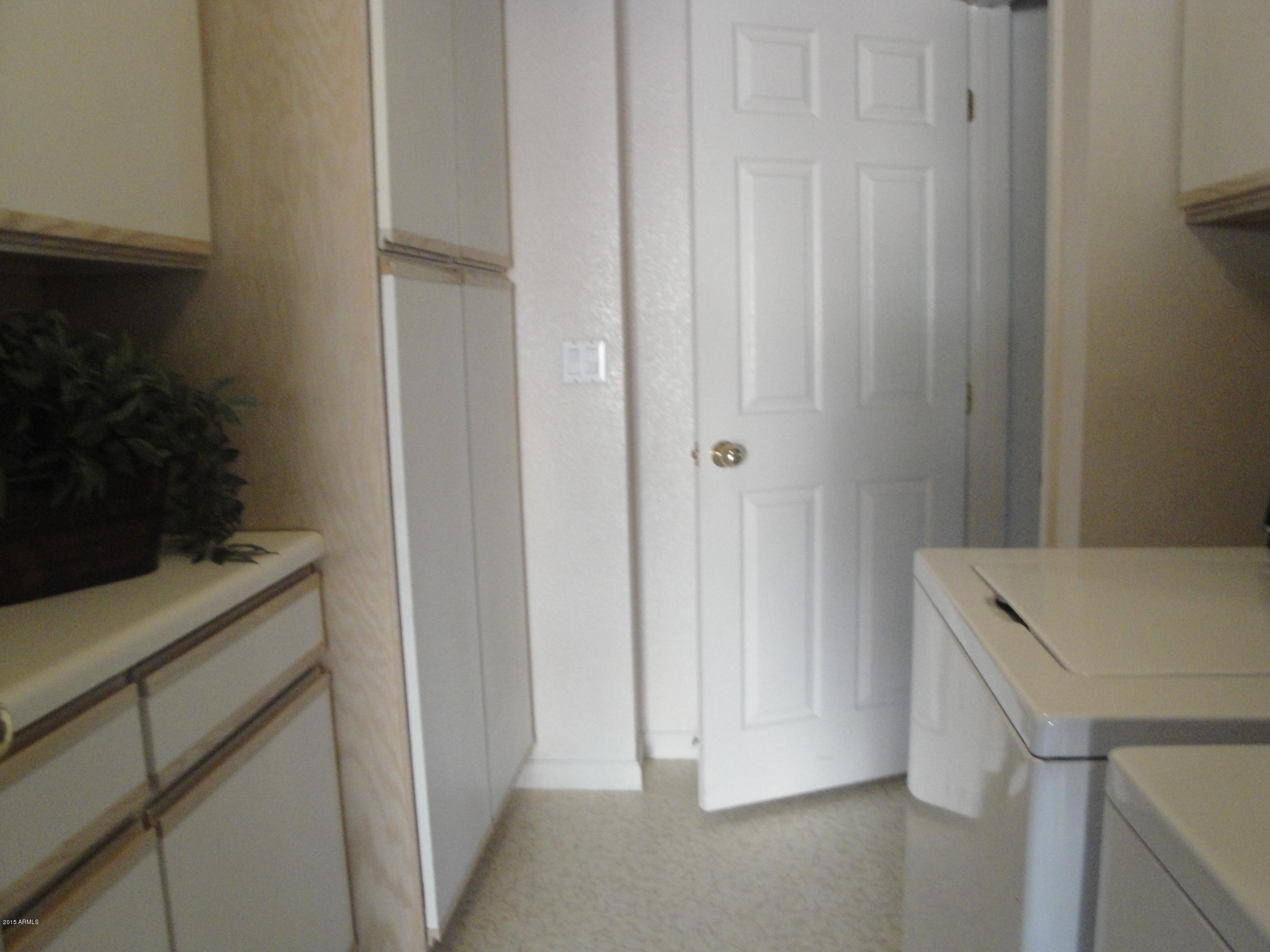 7222 East Gainey Ranch Road, Unit 114 Scottsdale, AZ 85258 - Photo 45 of 53 LAUNDRY