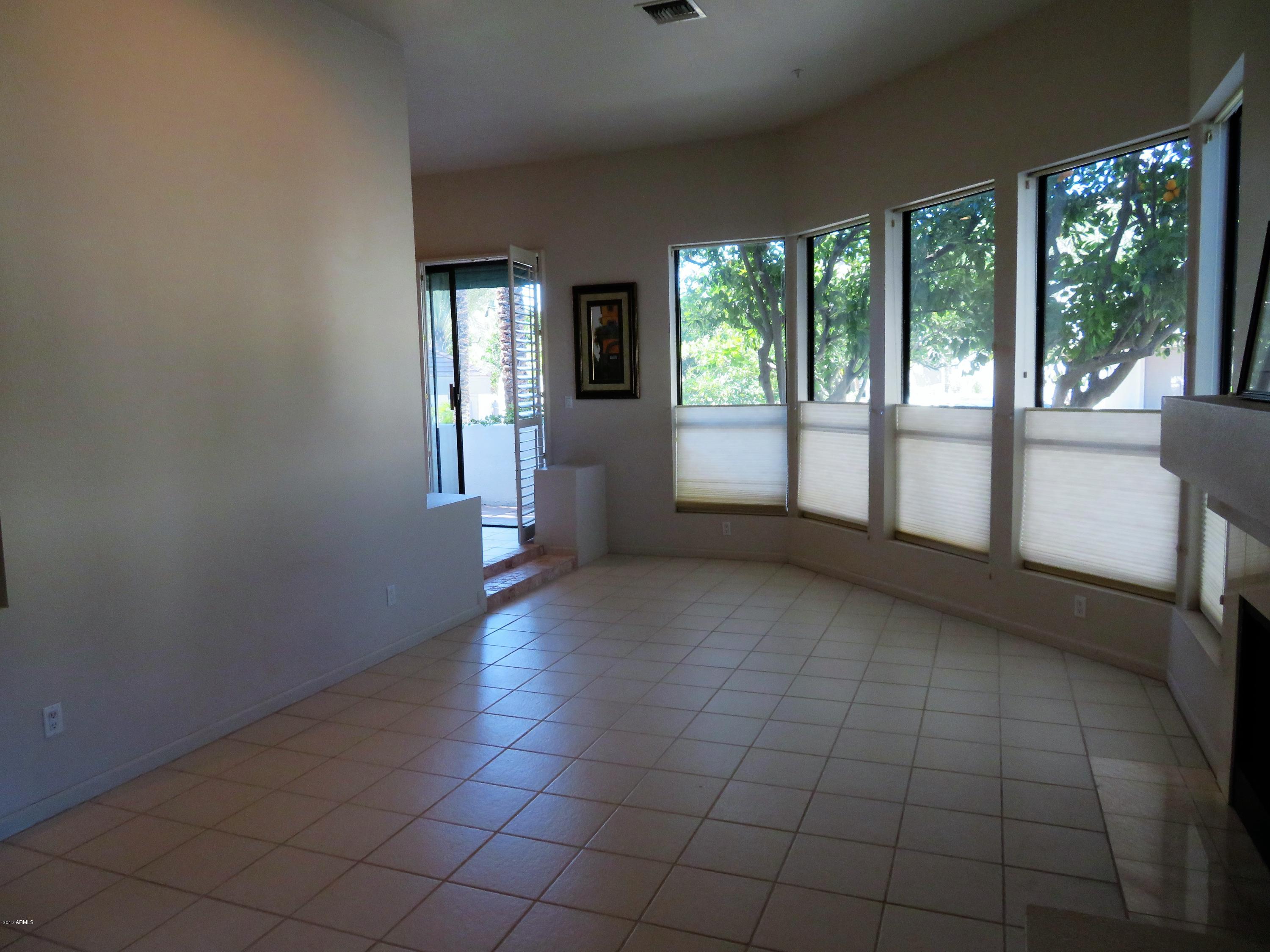7222 East Gainey Ranch Road, Unit 114 Scottsdale, AZ 85258 - Photo 10 of 53 LIVING ROOM W TREE VIEWS