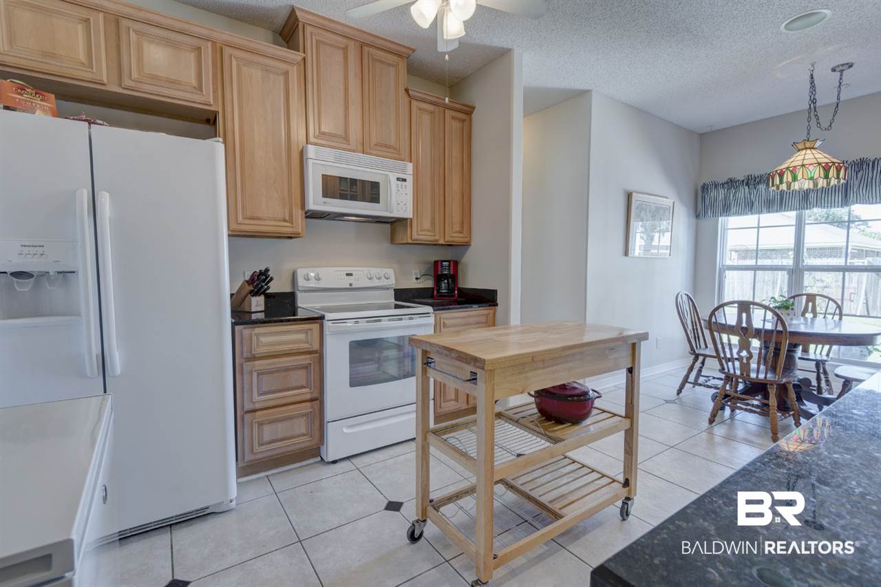 22195 Buck Road Robertsdale, AL 36567 - Photo 21 of 36 Glass top electric Range; Refrigerator w/Ice Maker