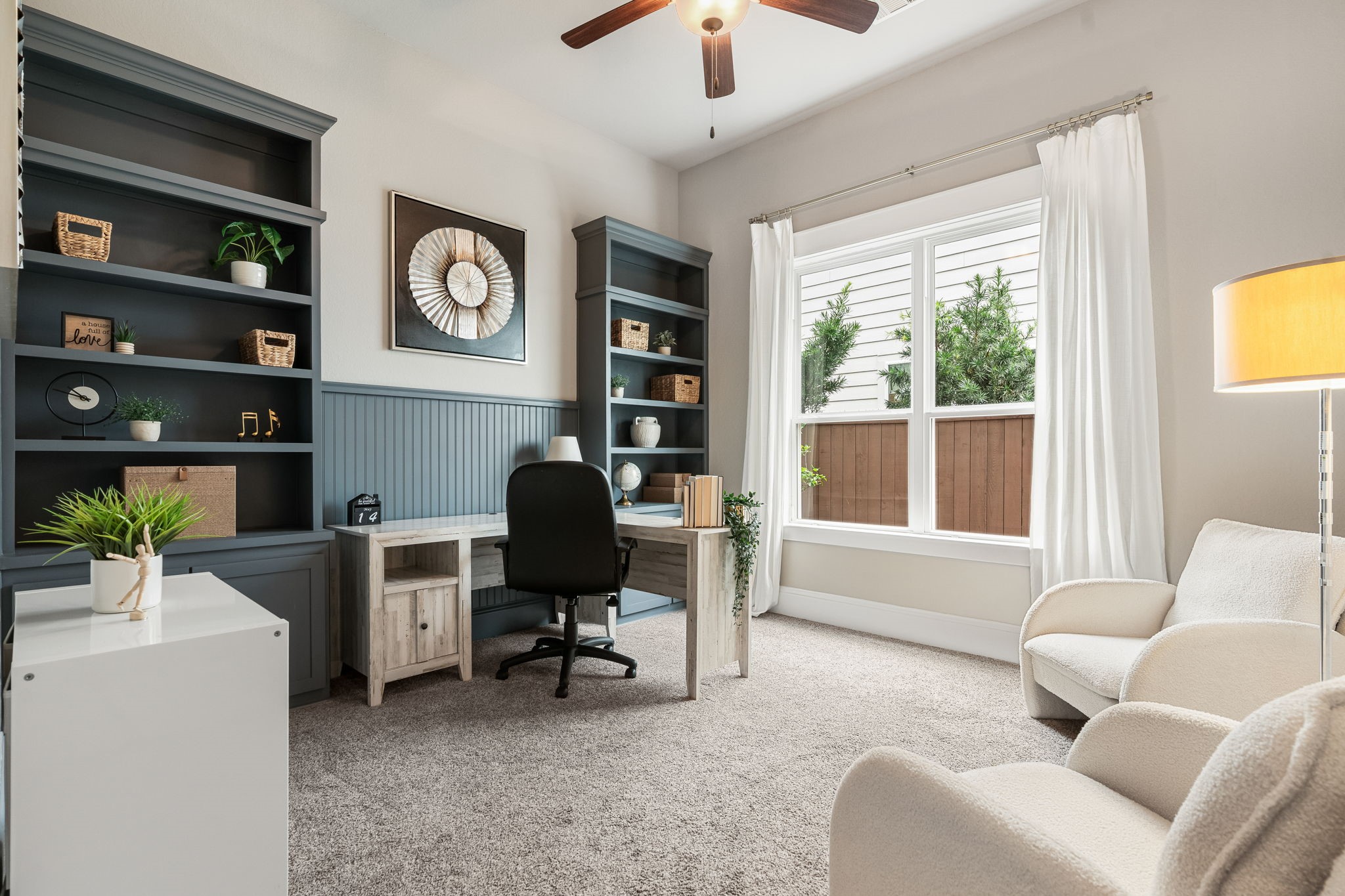 2206 Rope Maker Road Conroe, TX 77384 - Photo 10 of 42 Private study with custom built-ins creates the perfect work-from-home space or quiet retreat.