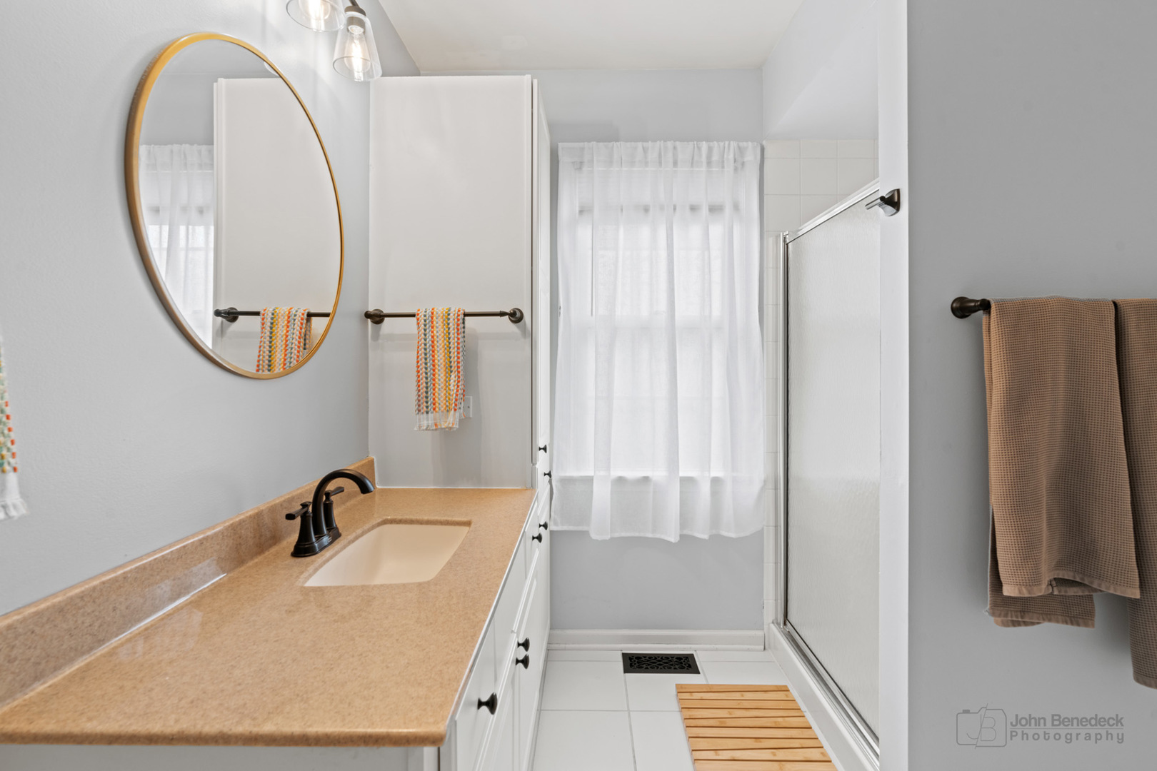 3620 Lakeview Drive Algonquin, IL 60102 - Photo 14 of 25 a bathroom with a sink and a mirror
