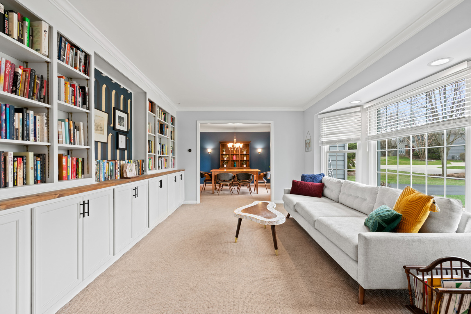 3620 Lakeview Drive Algonquin, IL 60102 - Photo 2 of 25 a living room with furniture and a book shelf
