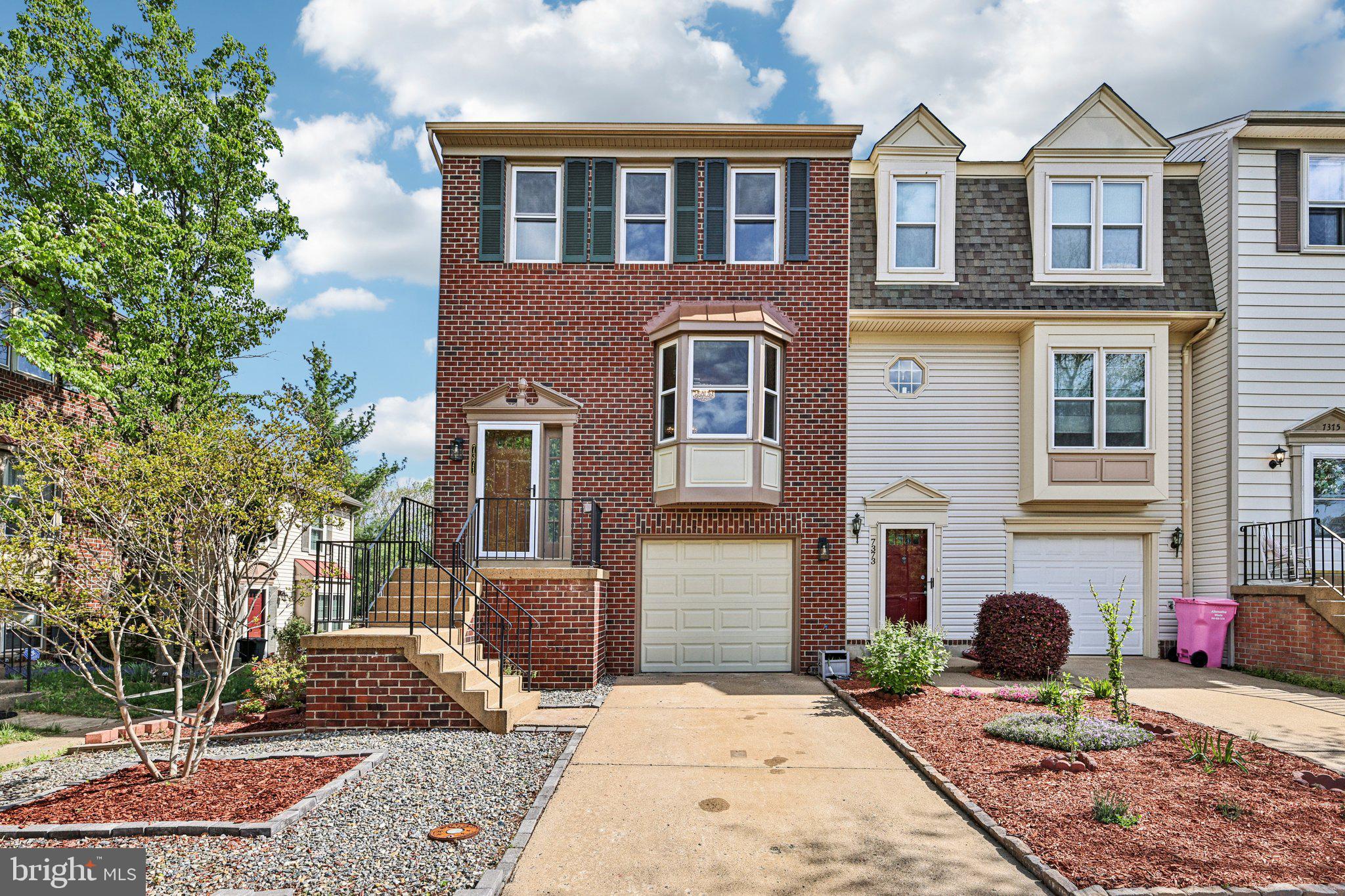 7371 St Thomas Loop Manassas, VA 20109 - Photo 1 of 1 Charming brick-front townhouse awaits!