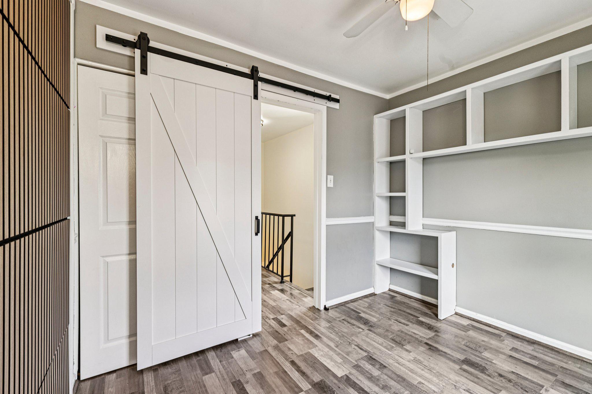 7371 St Thomas Loop Manassas, VA 20109 - Photo 16 of 31 a view of walk in closet with empty racks