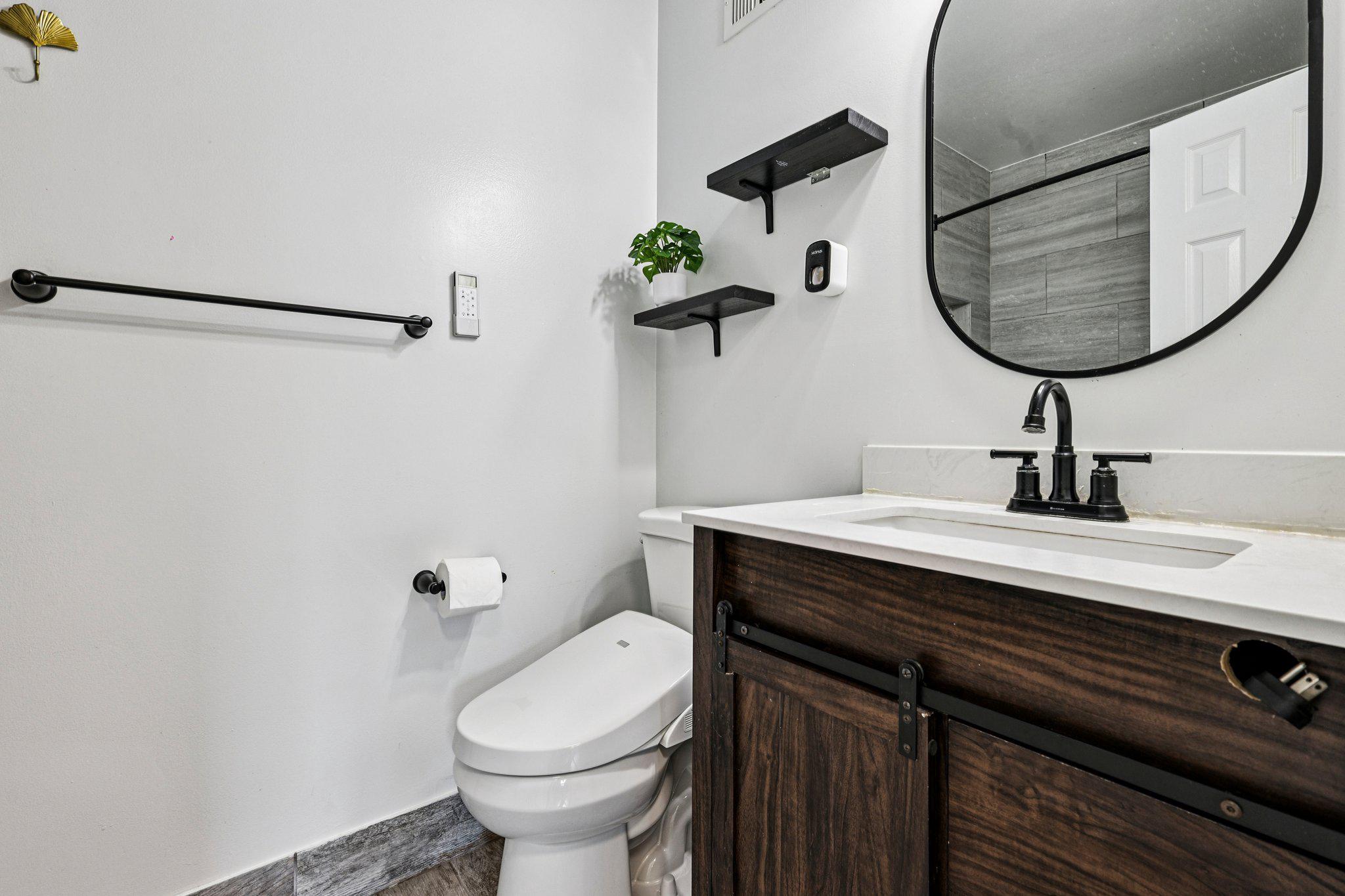 7371 St Thomas Loop Manassas, VA 20109 - Photo 18 of 31 a bathroom with a sink and a mirror