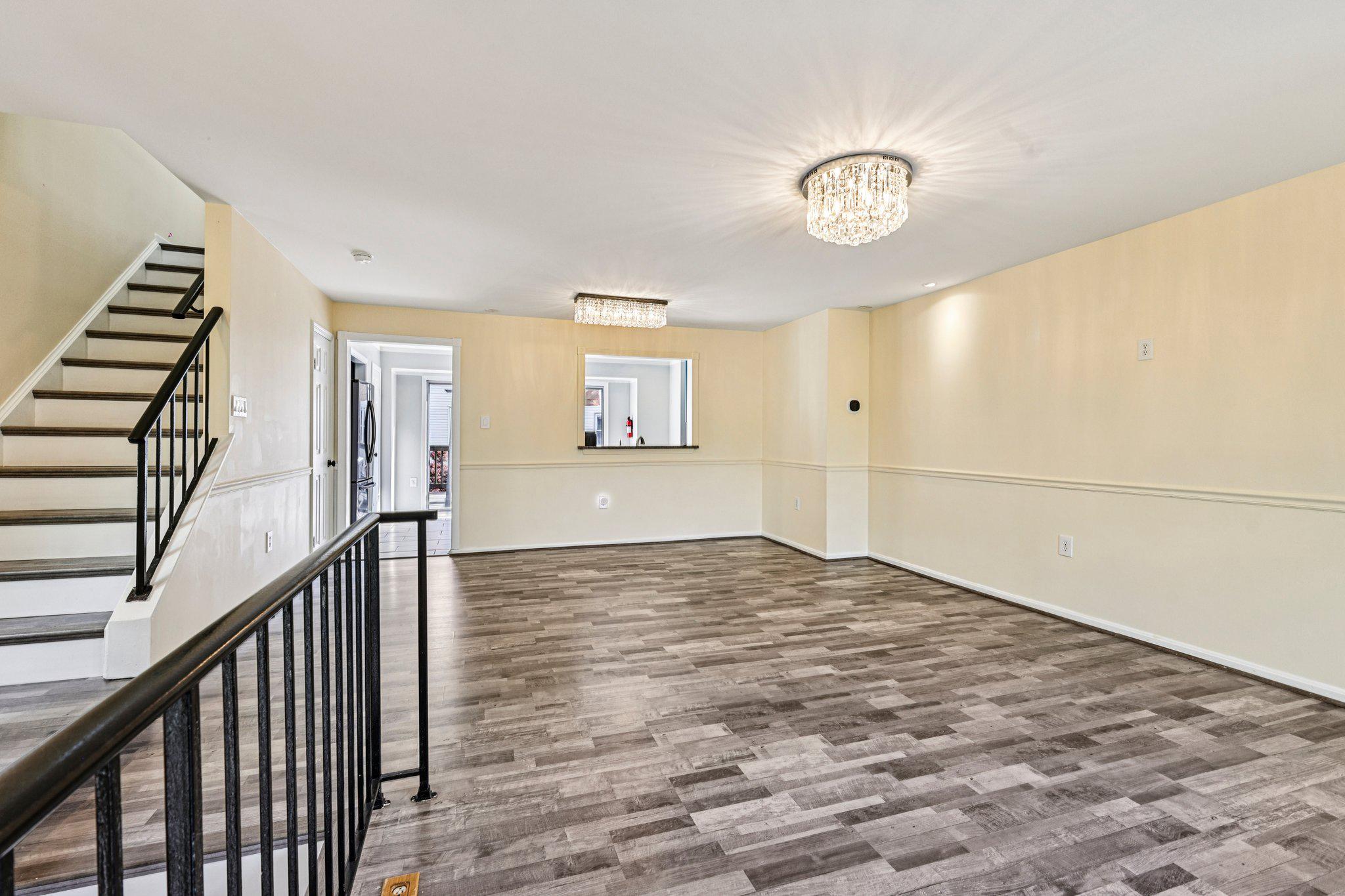 7371 St Thomas Loop Manassas, VA 20109 - Photo 2 of 31 a view of empty room with wooden floor