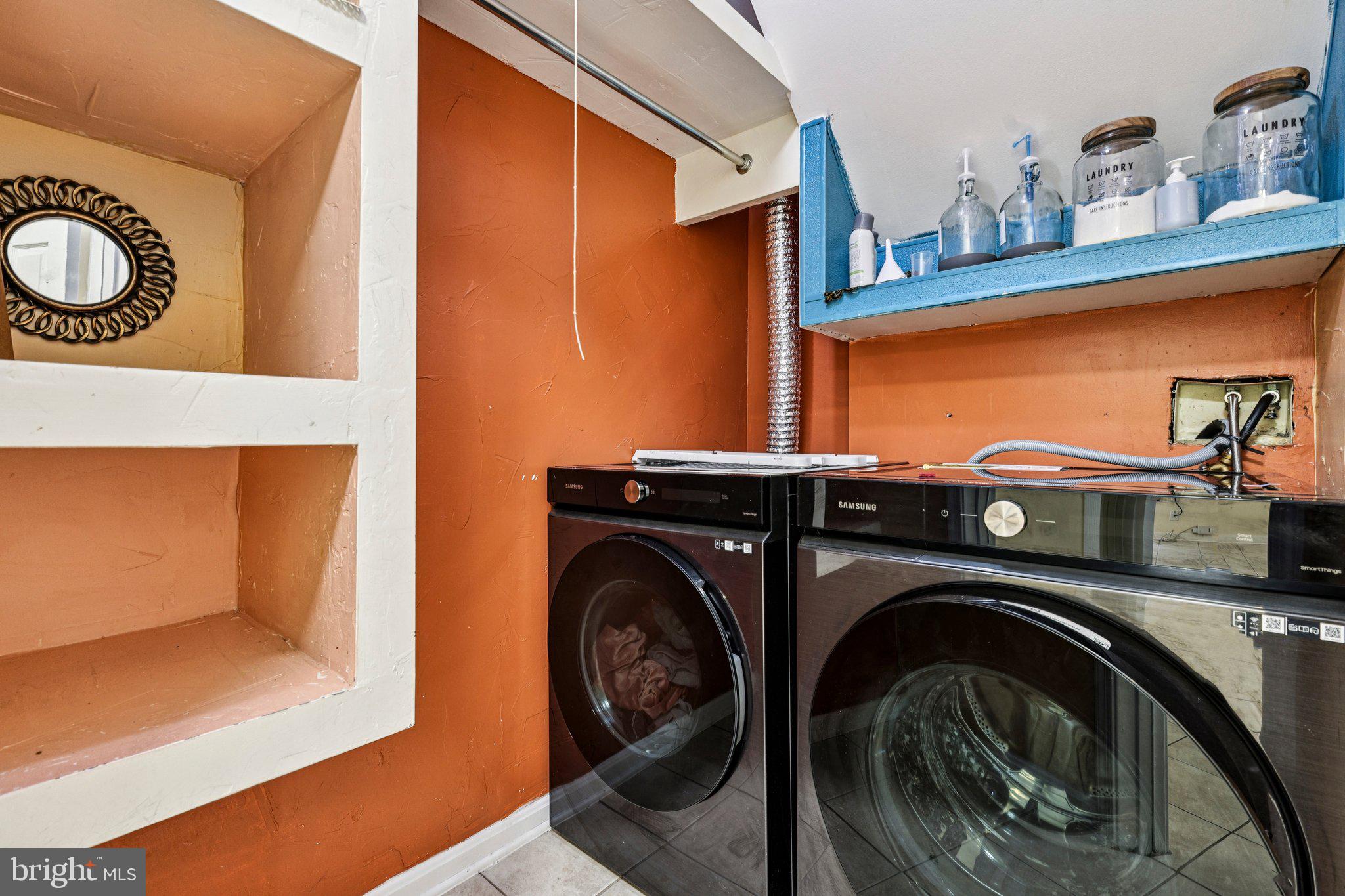 7371 St Thomas Loop Manassas, VA 20109 - Photo 23 of 31 a utility room with dryer and washer