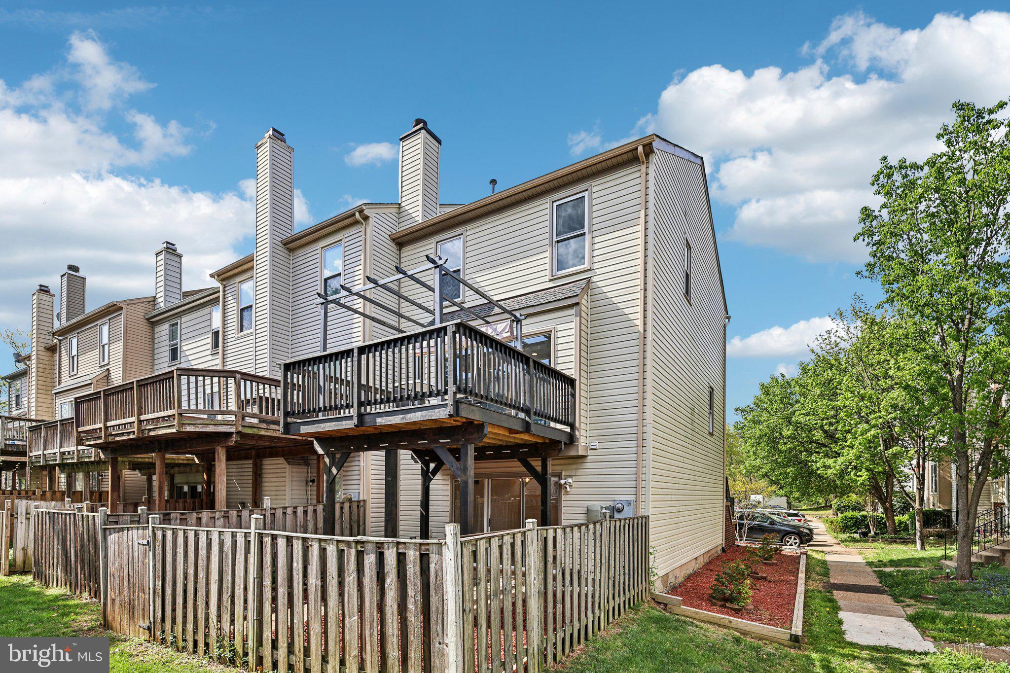 7371 St Thomas Loop Manassas, VA 20109 - Photo 25 of 31 a view of a house with a yard