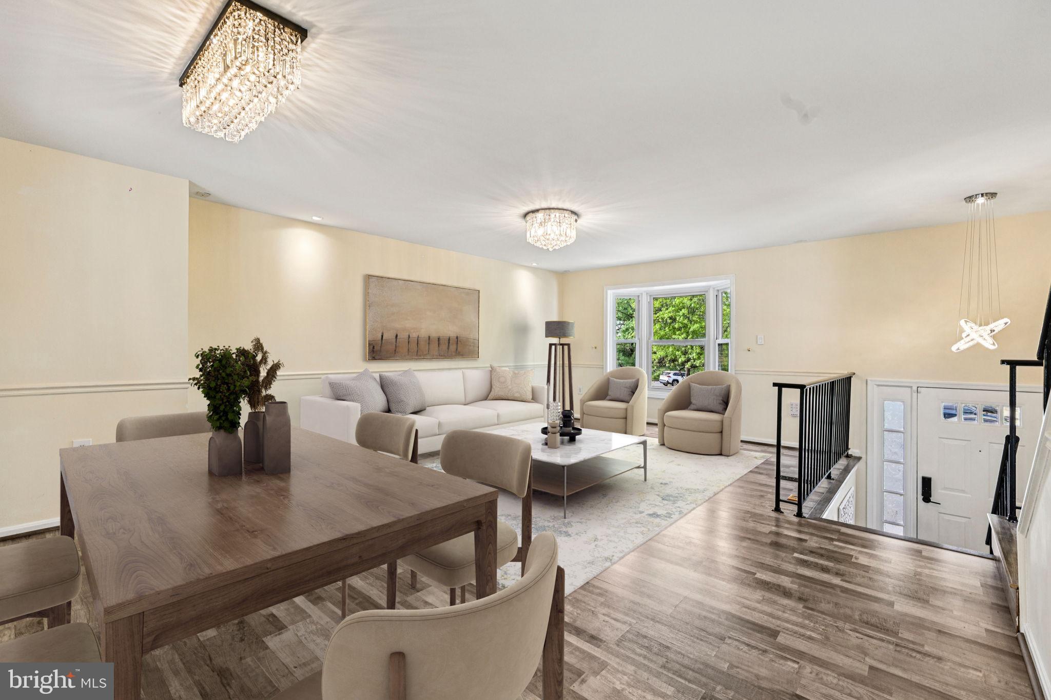7371 St Thomas Loop Manassas, VA 20109 - Photo 4 of 31 a view of a dining room with furniture window and wooden floor
