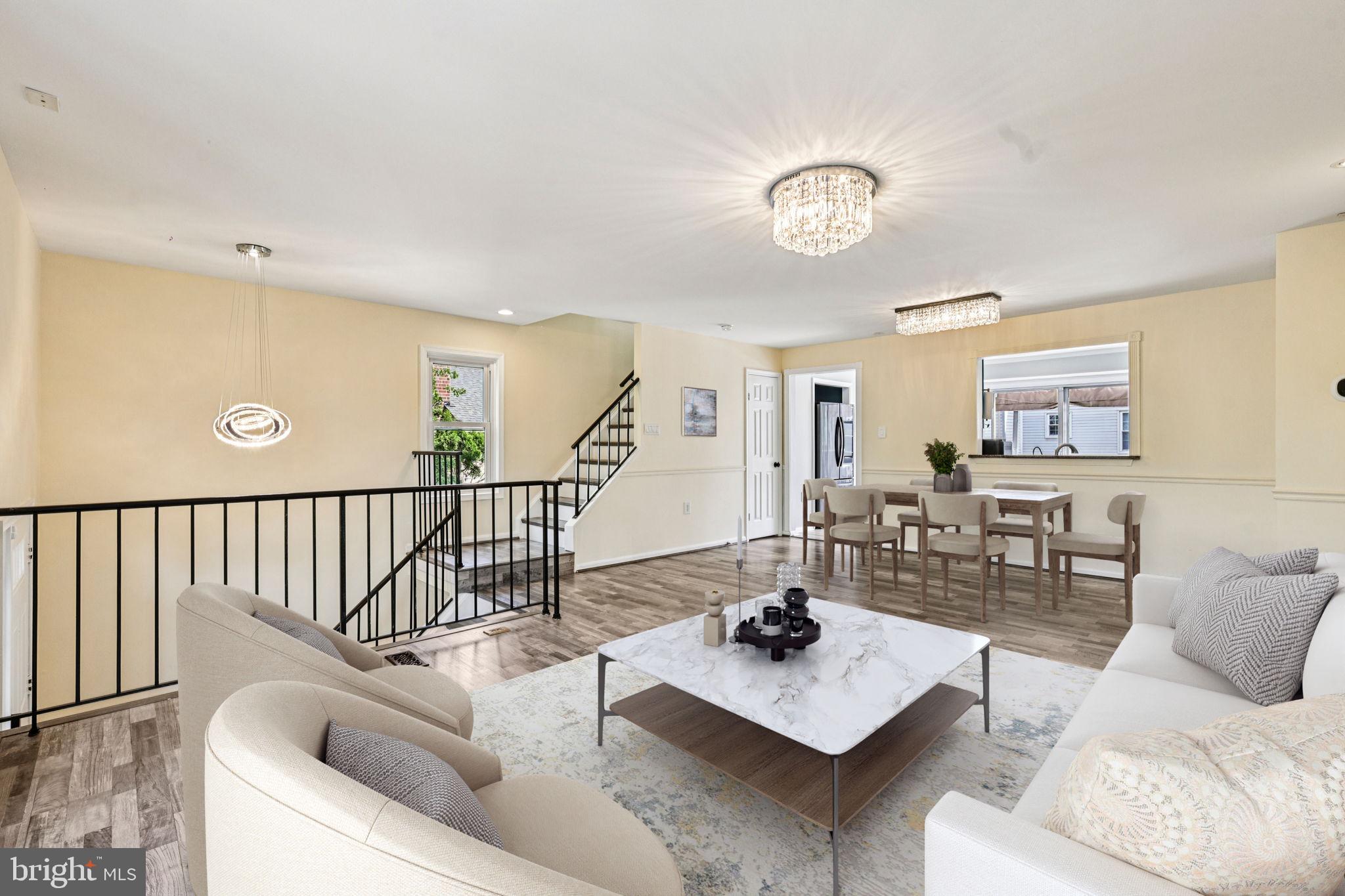 7371 St Thomas Loop Manassas, VA 20109 - Photo 6 of 31 a living room with furniture and a table
