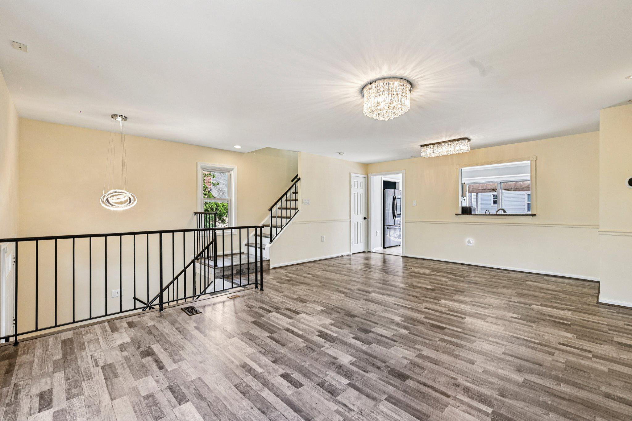 7371 St Thomas Loop Manassas, VA 20109 - Photo 7 of 31 a view of a livingroom with wooden floor