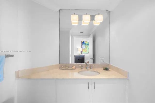 a view of swimming pool with a table and chairs