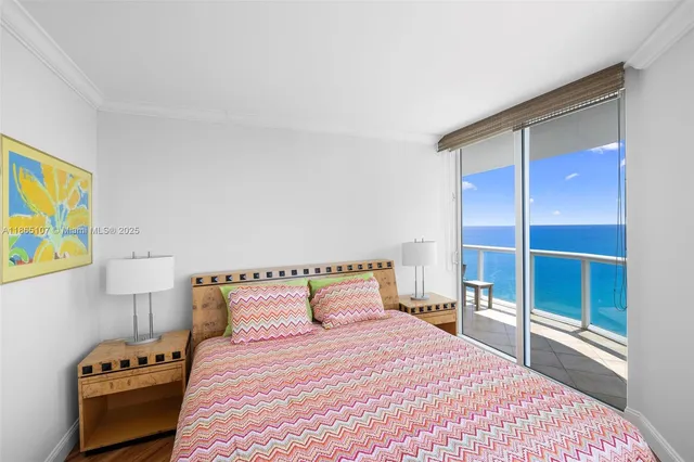 a view of a swimming pool with a lounge chairs