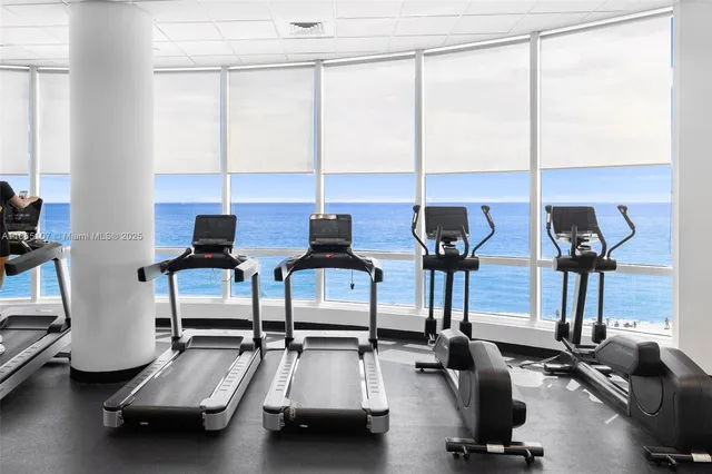 a view of a chairs and table in the patio