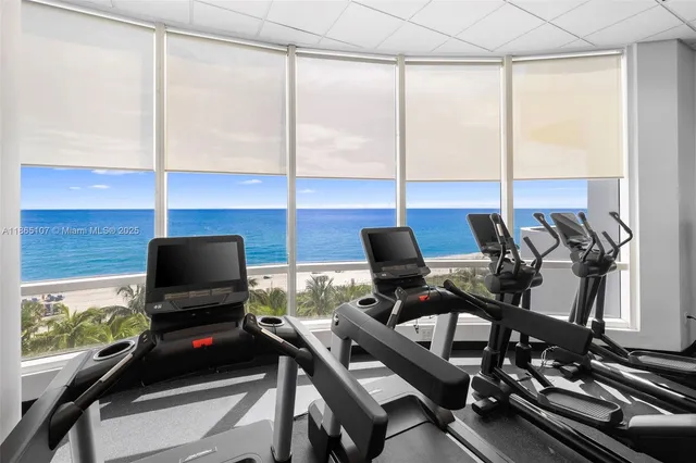 a view of swimming pool with a patio