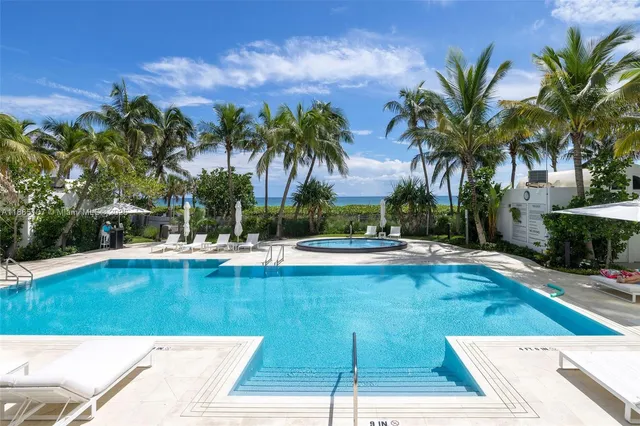 a view of a yard with cars