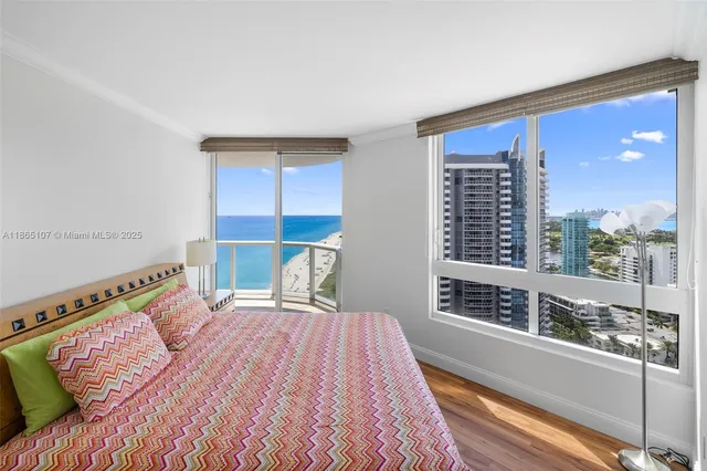 a view of a living room with a large window