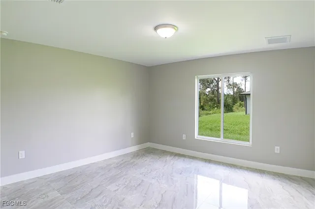 an empty room with a window