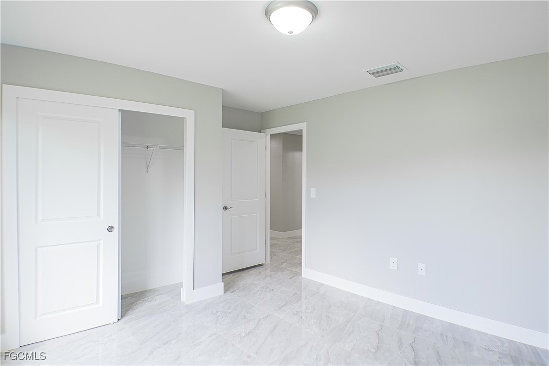 2020 East 12th Street Lehigh Acres, FL 33972 - Photo 8 of 17 a view of an empty room
