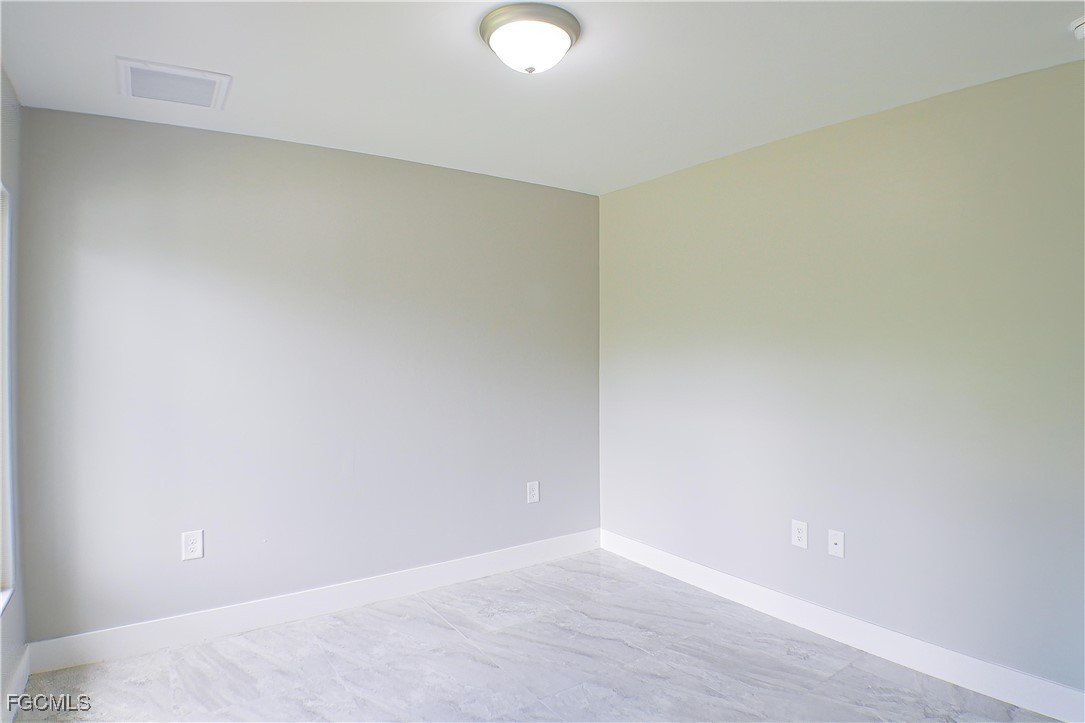 2020 East 12th Street Lehigh Acres, FL 33972 - Photo 9 of 17 a view of an empty room