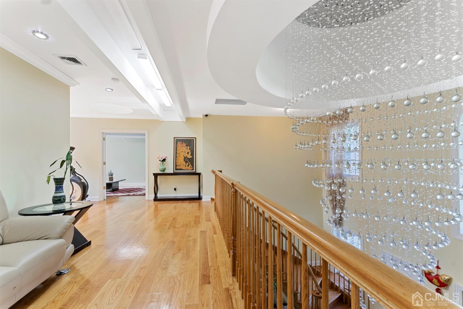 429 Plainfield Road Edison, NJ 08820 - Photo 13 of 26 a view of a hallway with a livingroom and furniture