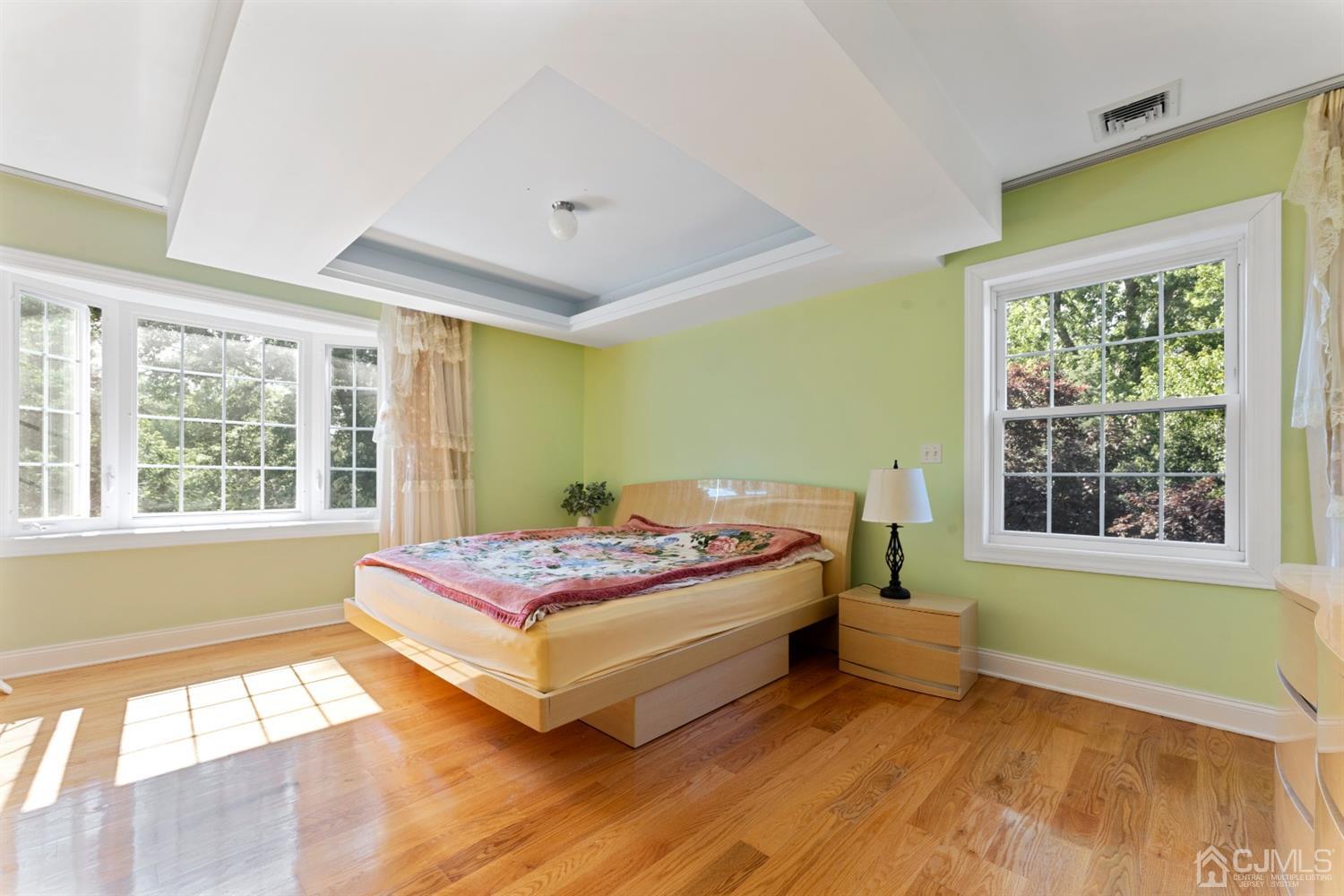429 Plainfield Road Edison, NJ 08820 - Photo 16 of 26 a bedroom with a bed and windows