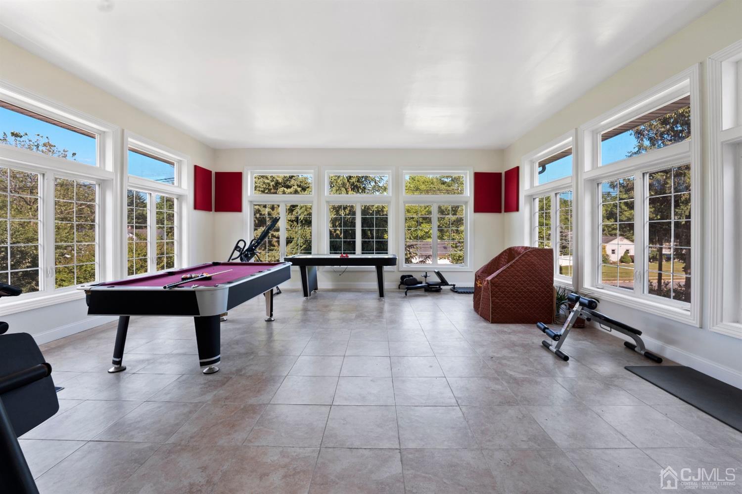 429 Plainfield Road Edison, NJ 08820 - Photo 20 of 26 a room with furniture pool table and windows