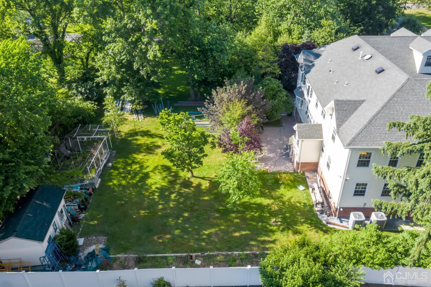 429 Plainfield Road Edison, NJ 08820 - Photo 26 of 26 an aerial view of a house with a yard and fountain