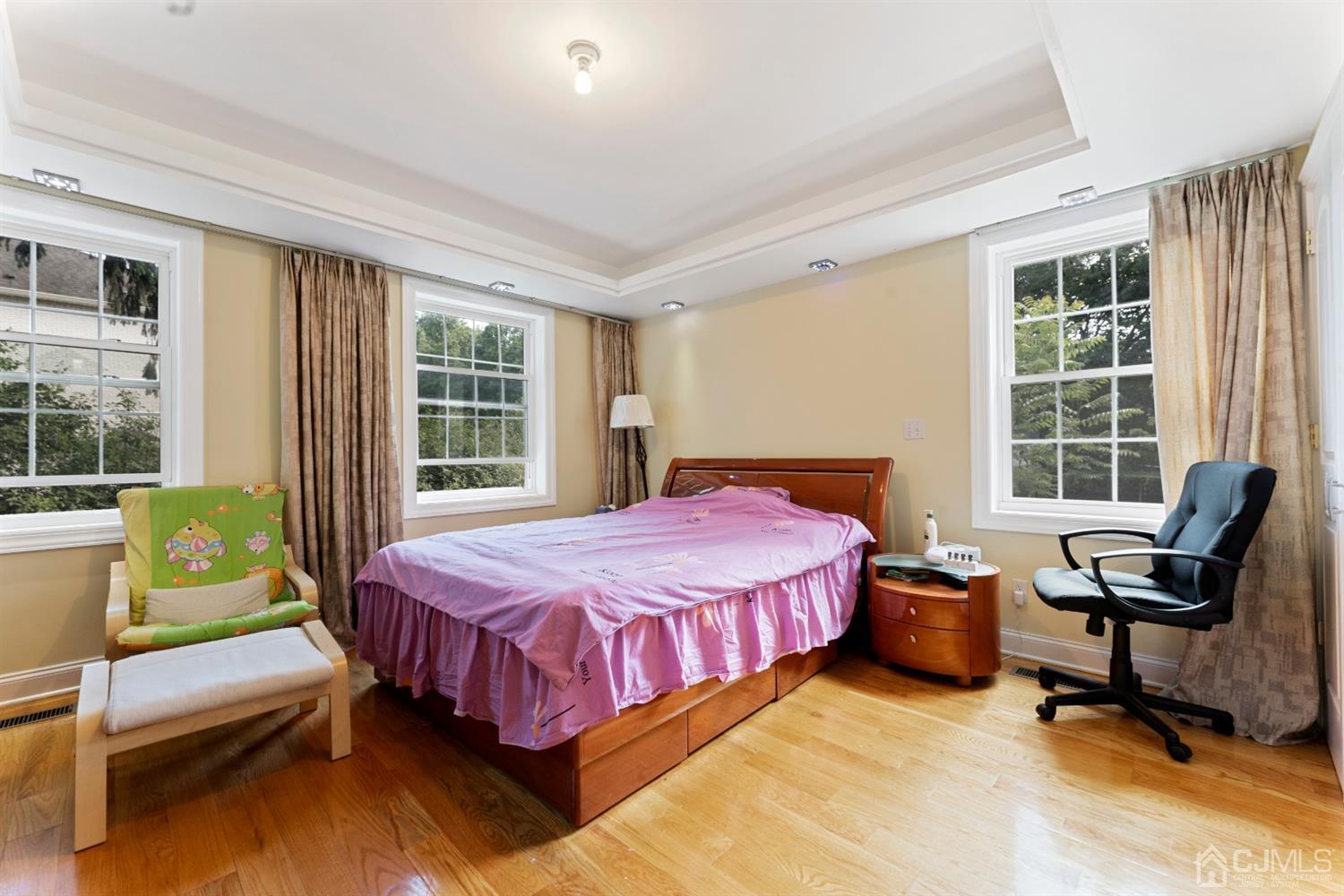 429 Plainfield Road Edison, NJ 08820 - Photo 10 of 26 a bedroom with a bed chair and a window