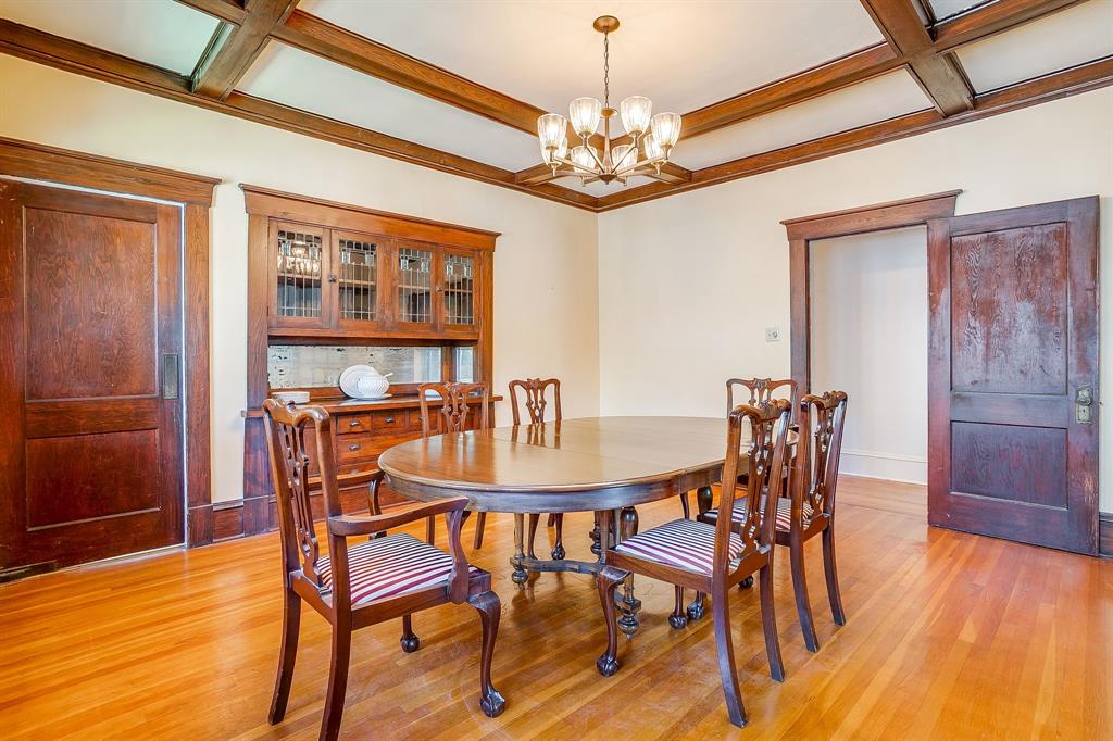 2124 Weatherbee Street Fort Worth, TX 76110 - Photo 17 of 39 a view of a dining room with furniture and wooden floor