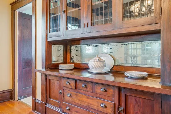 a kitchen with a sink and a large window