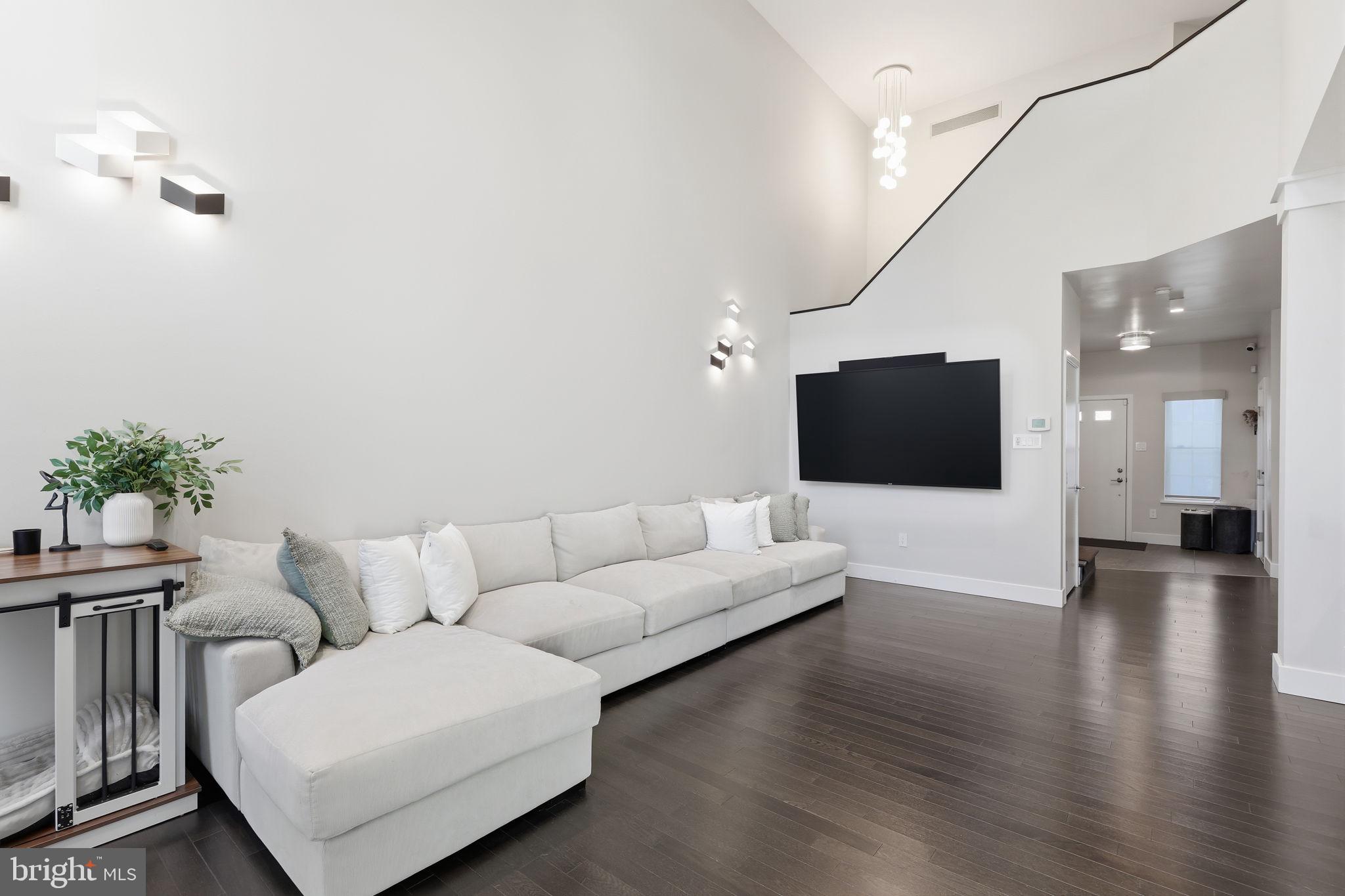 426 Fairview Way New Hope, PA 18938 - Photo 11 of 40 a living room with furniture and a flat screen tv