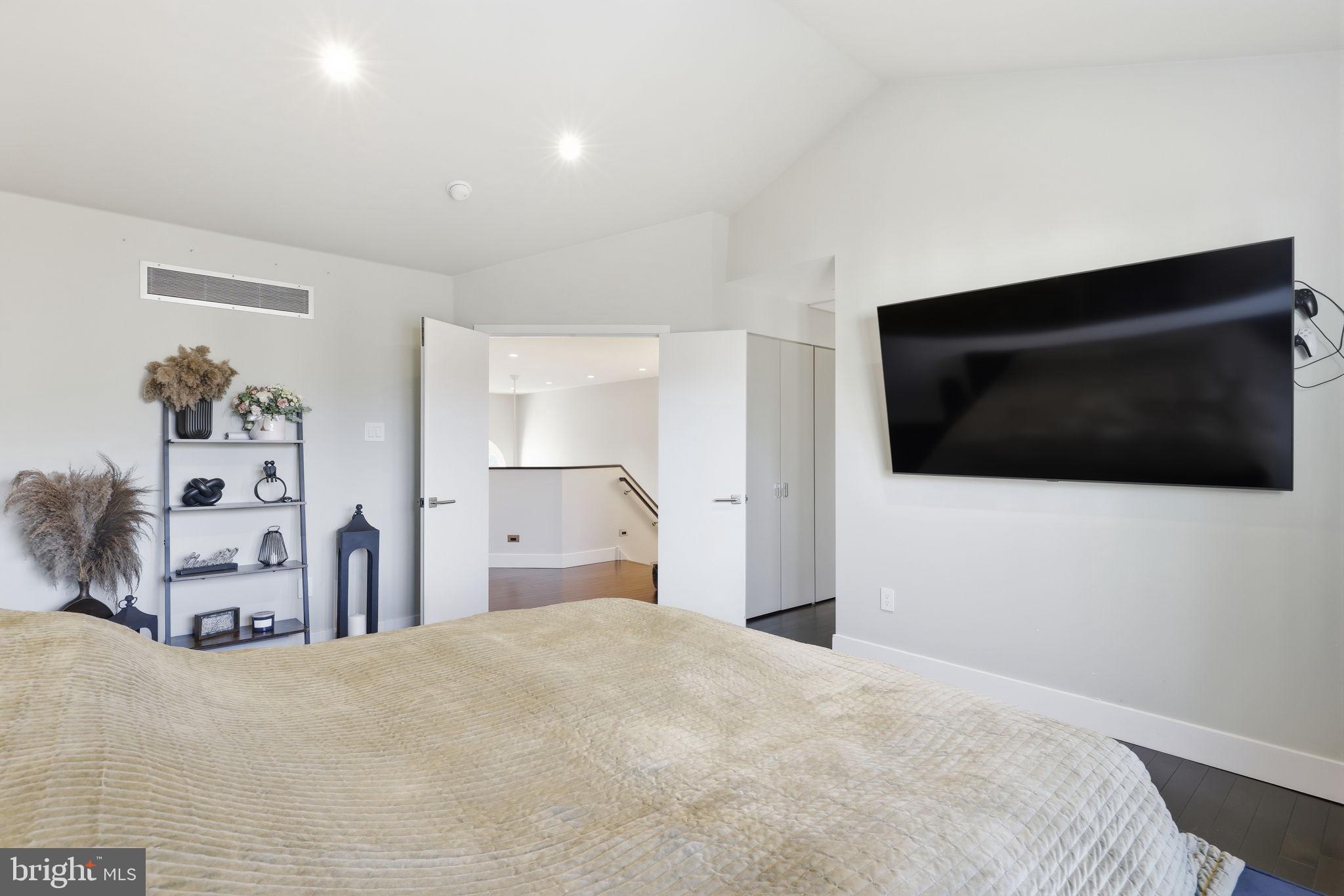 426 Fairview Way New Hope, PA 18938 - Photo 29 of 40 a bedroom with a bed and a flat screen tv