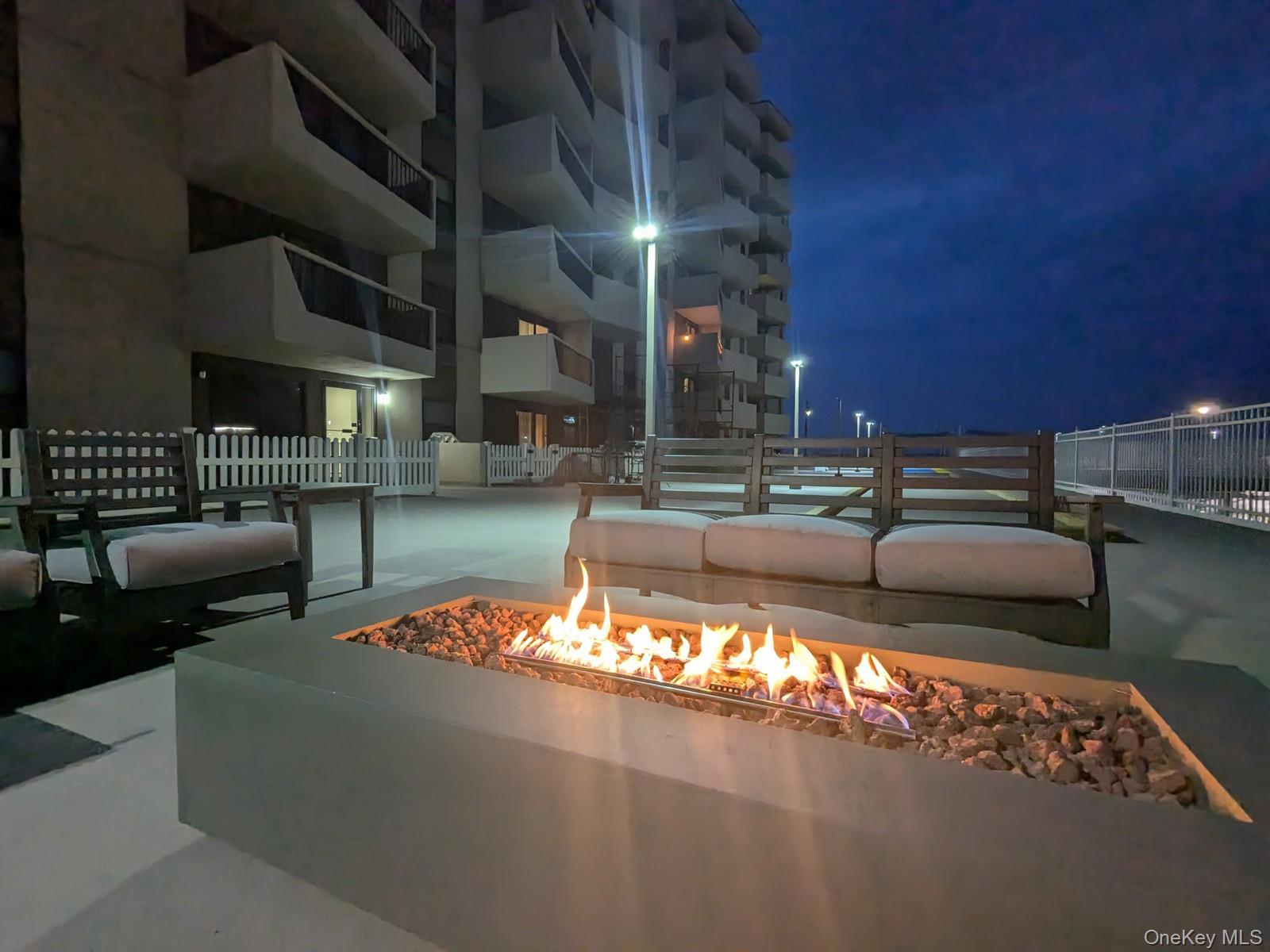 360 Shore Road, Unit 4B Long Beach, NY 11561 - Photo 10 of 28 Surrounding community with a fire pit