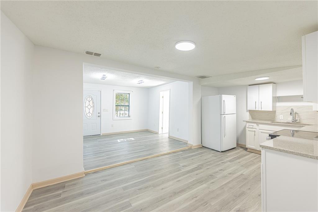 6197 Union Grove Road Lithia Springs, GA 30122 - Photo 10 of 24 a view of an empty room and window