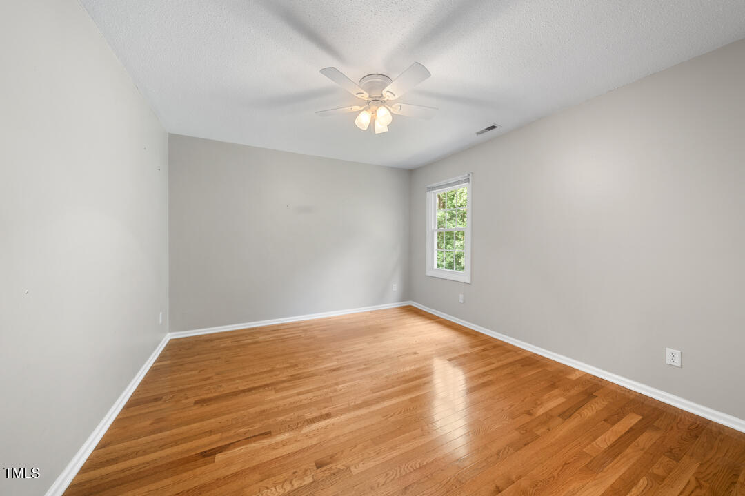 122 Stedwick Place Durham, NC 27712 - Photo 24 of 35 a view of an empty room with a window