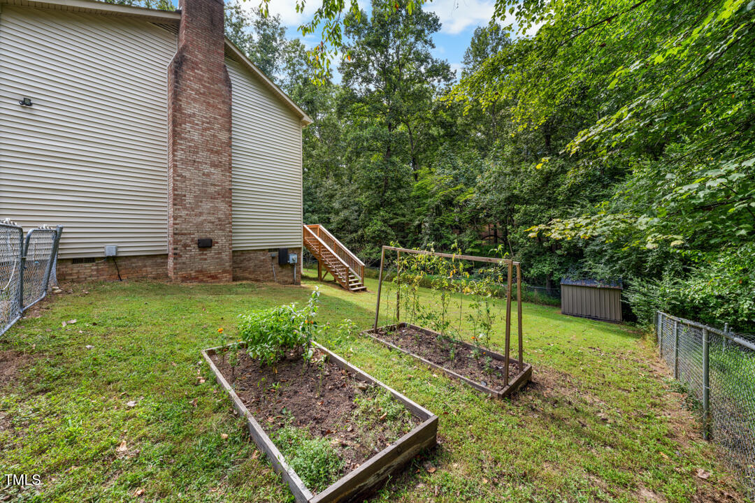 122 Stedwick Place Durham, NC 27712 - Photo 29 of 35 a view of a chair and table in the garden