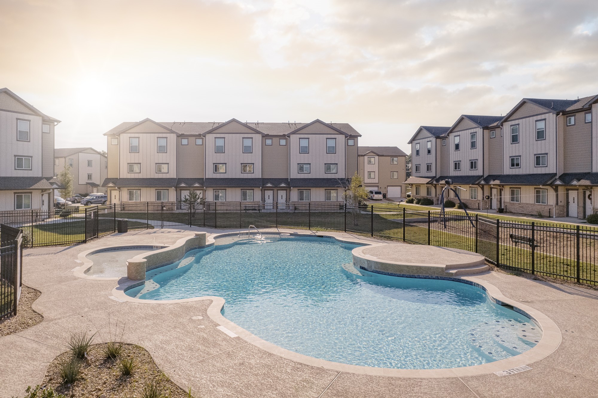 12603 Telge Road, Unit 28E Cypress, TX 77429 - Photo 22 of 32 a view of a swimming pool with a lounge chair