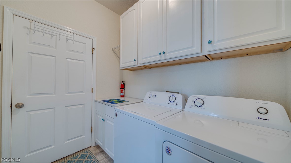 3181 Matecumbe Key Road, Unit 4 Punta Gorda, FL 33955 - Photo 16 of 50 a utility room with dryer and washer