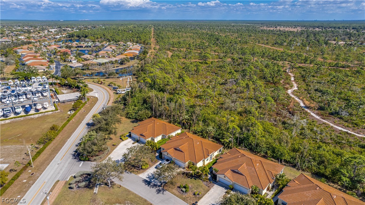 3181 Matecumbe Key Road, Unit 4 Punta Gorda, FL 33955 - Photo 38 of 50 an aerial view of a house with a yard