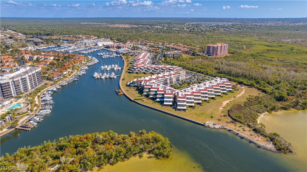 3181 Matecumbe Key Road, Unit 4 Punta Gorda, FL 33955 - Photo 49 of 50 an aerial view of residential houses with outdoor space
