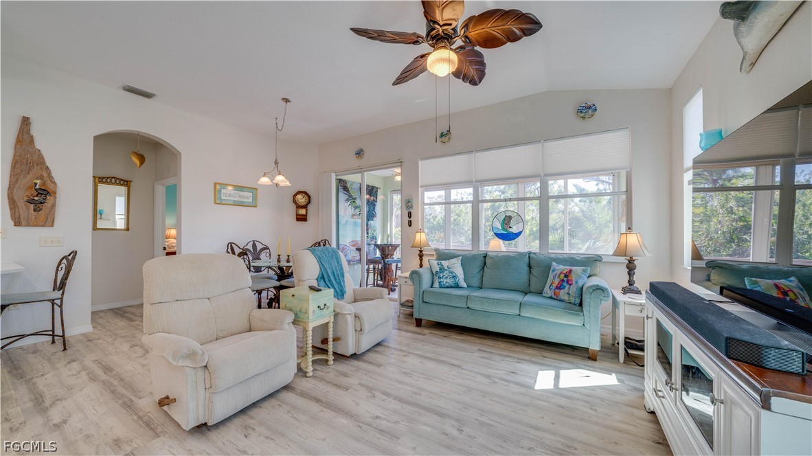 3181 Matecumbe Key Road, Unit 4 Punta Gorda, FL 33955 - Photo 6 of 50 a living room with furniture and a large window
