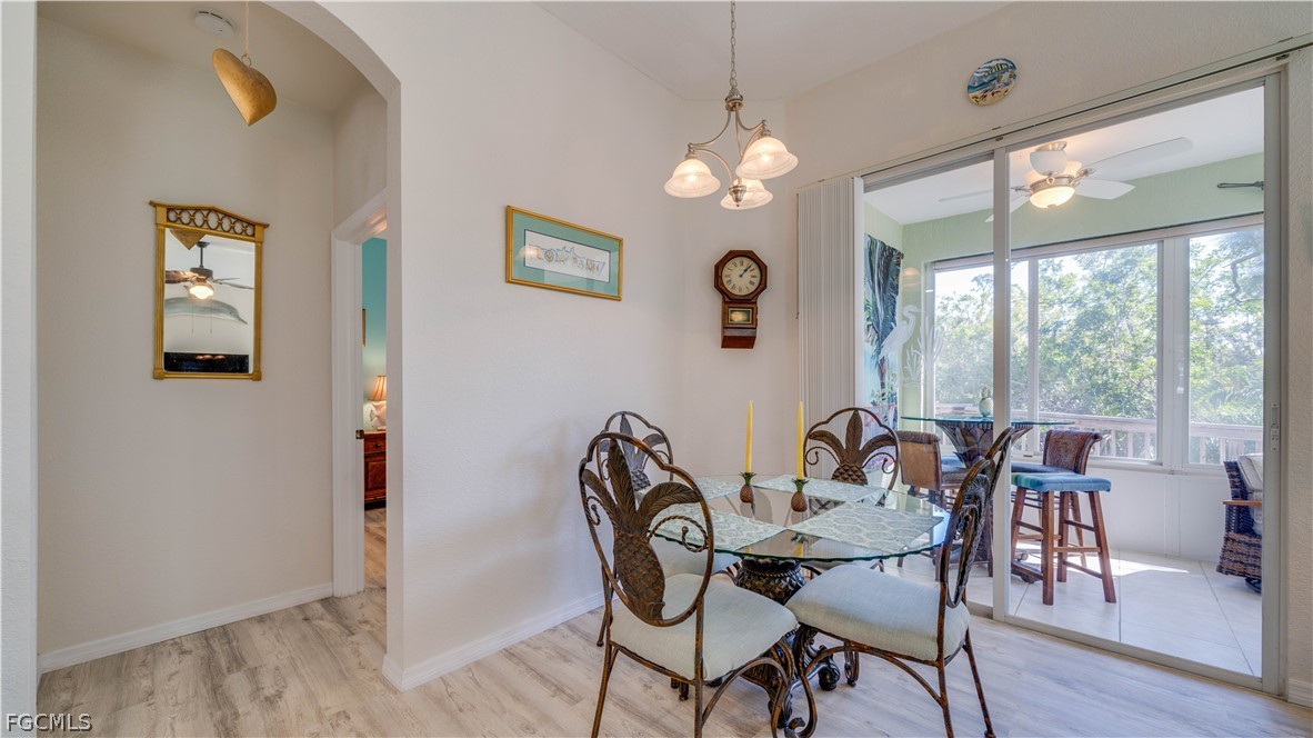 3181 Matecumbe Key Road, Unit 4 Punta Gorda, FL 33955 - Photo 8 of 50 a view of a dining room with furniture window and outside view
