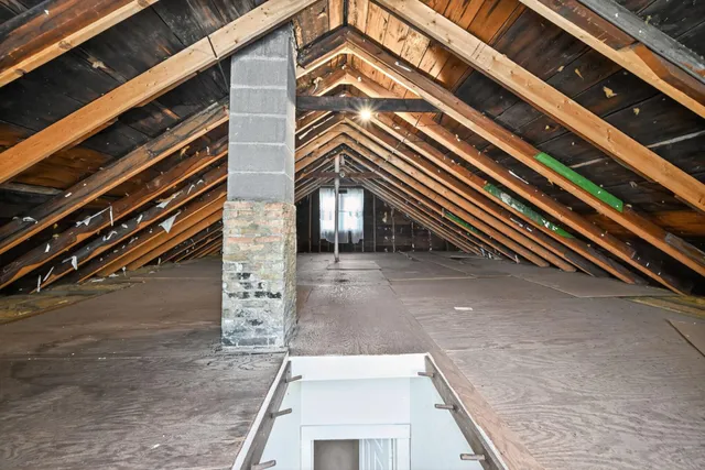 a view of a tiny house with a yard