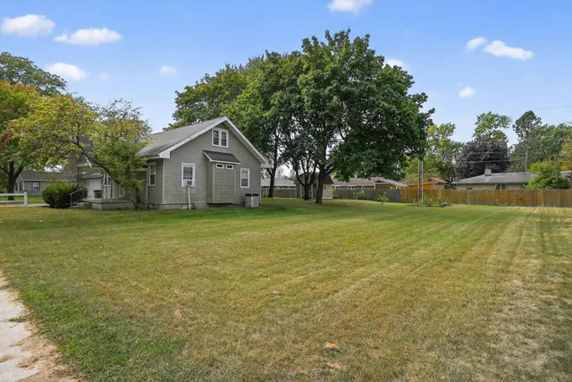 a view of a garden with a bench