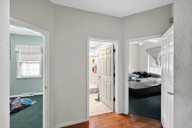 a bedroom with a bed and a closet