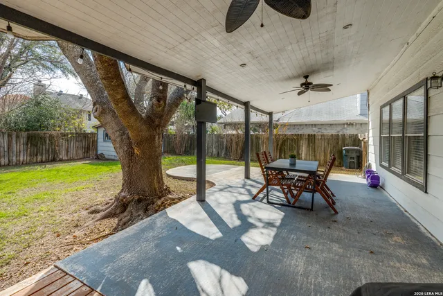 a view of a swimming pool with a patio
