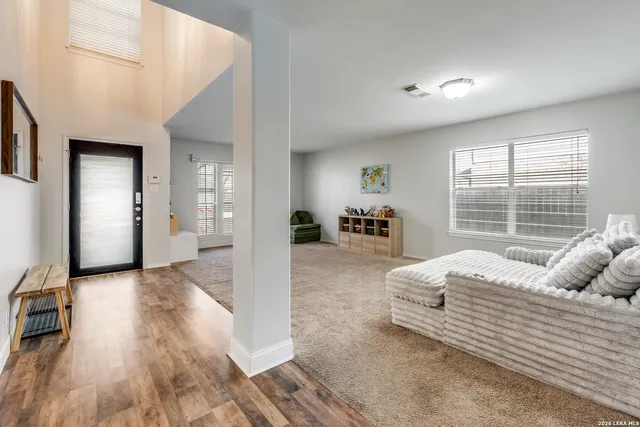 a bedroom with bed and window